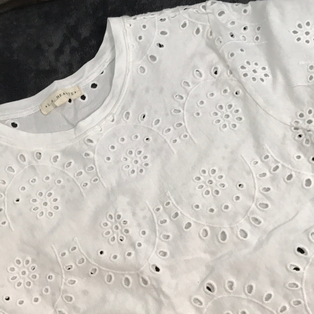 NEW WITHOUT TAGS shirt with small cutouts